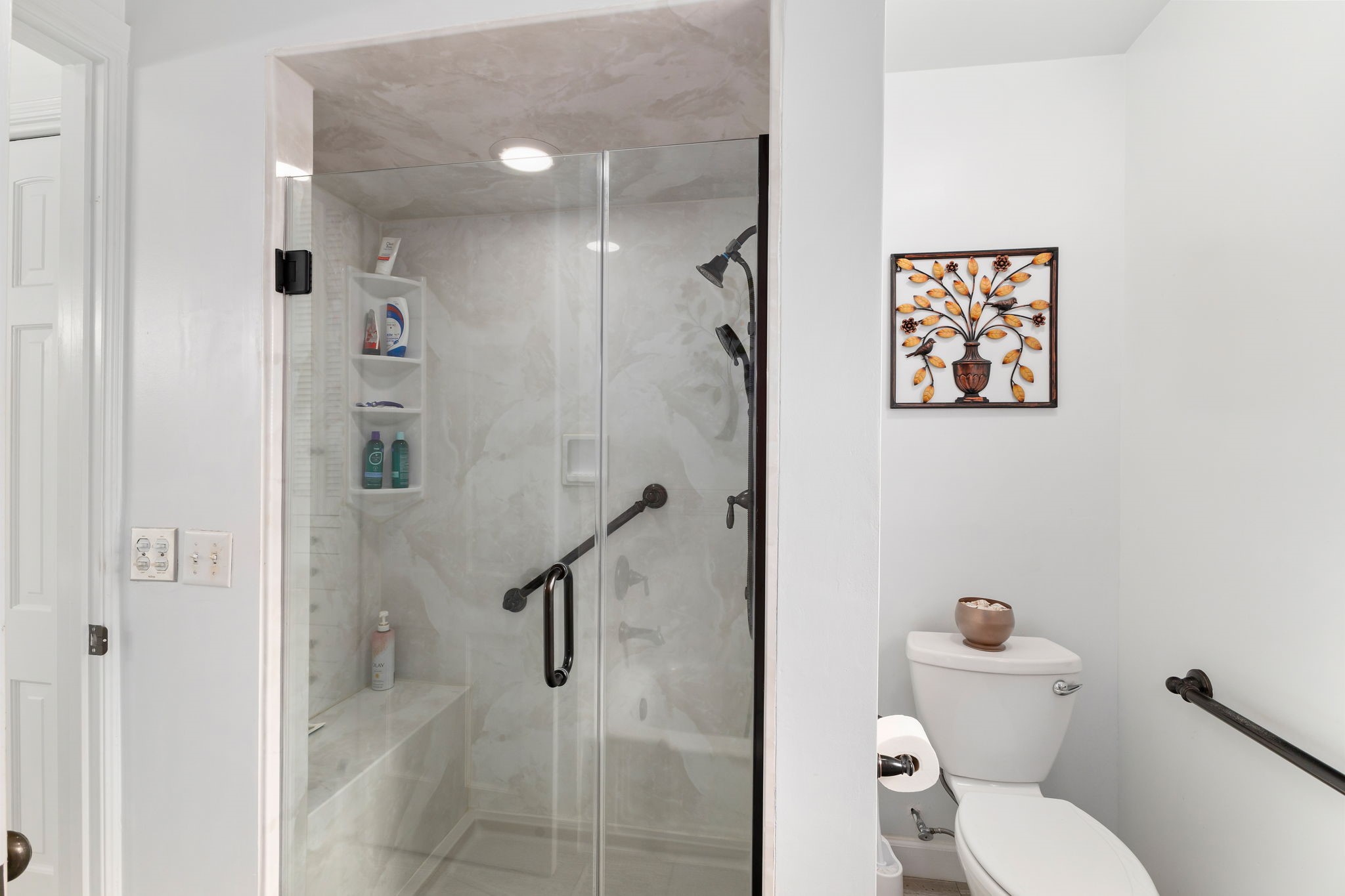 608 Bohlmann Avenue Schulenburg, TX 78956 - Photo 24 of 48 a bathroom with a toilet sink and shower