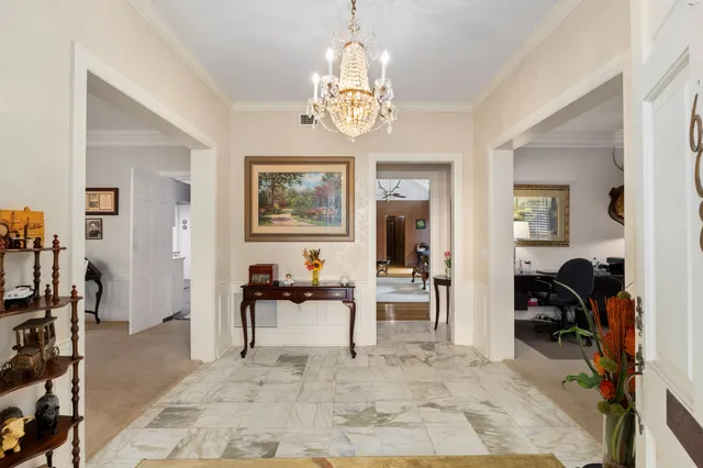 a view of living room filled with furniture