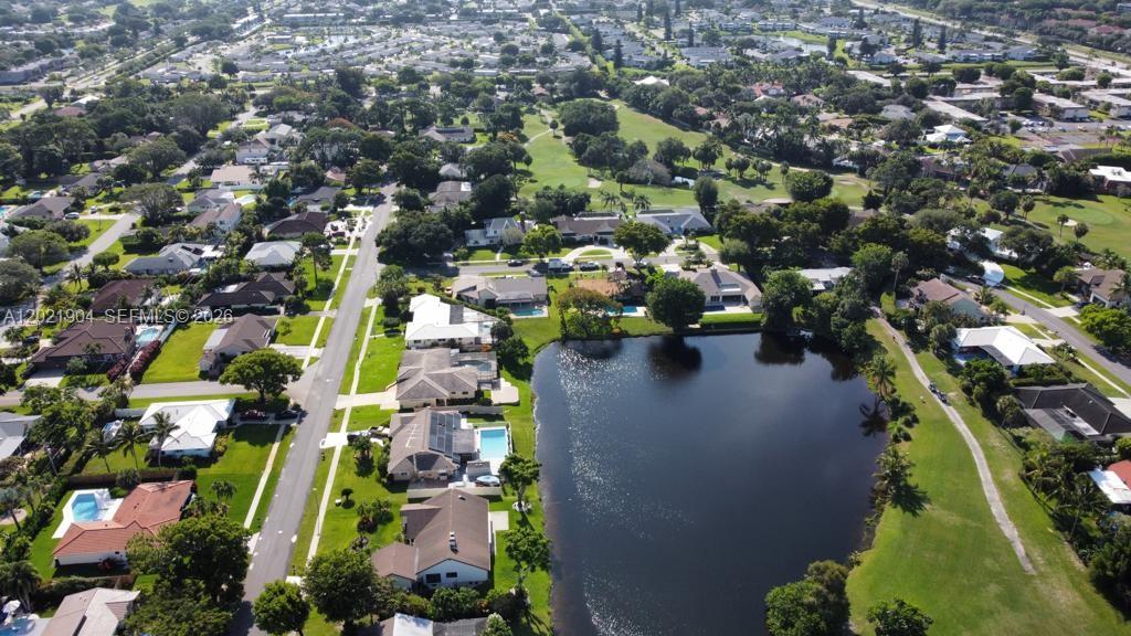 3324 Lakeview Boulevard Delray Beach, FL 33445 - Photo 33 of 36 an aerial view of residential houses with outdoor space