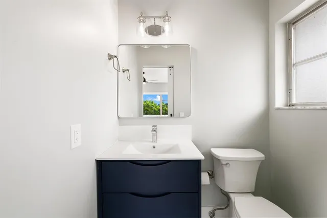 a bathroom with a sink and a toilet