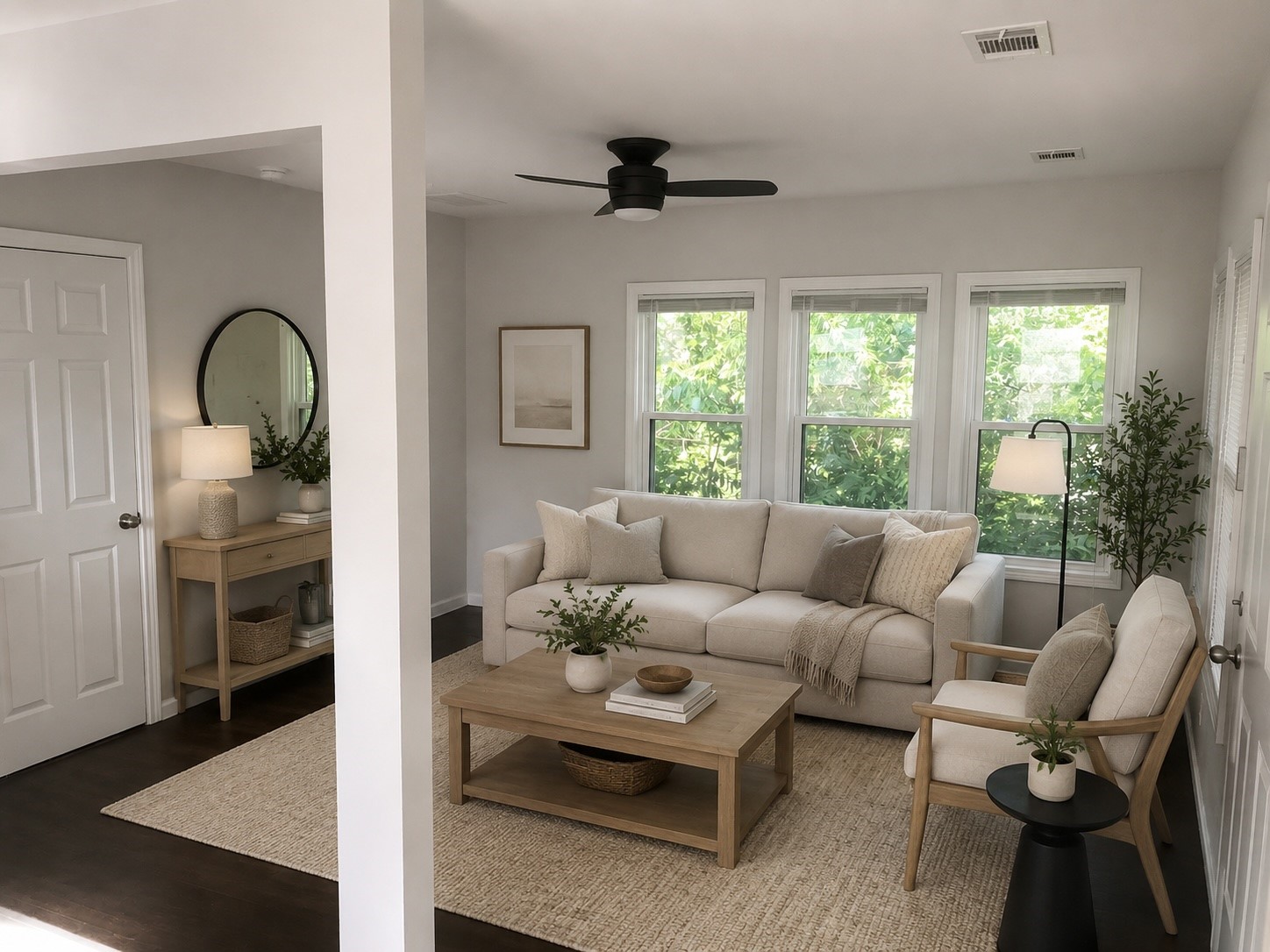 1825 1/2 Santa Rosa Street Houston, TX 77023 - Photo 6 of 7 a living room with furniture and a large window
