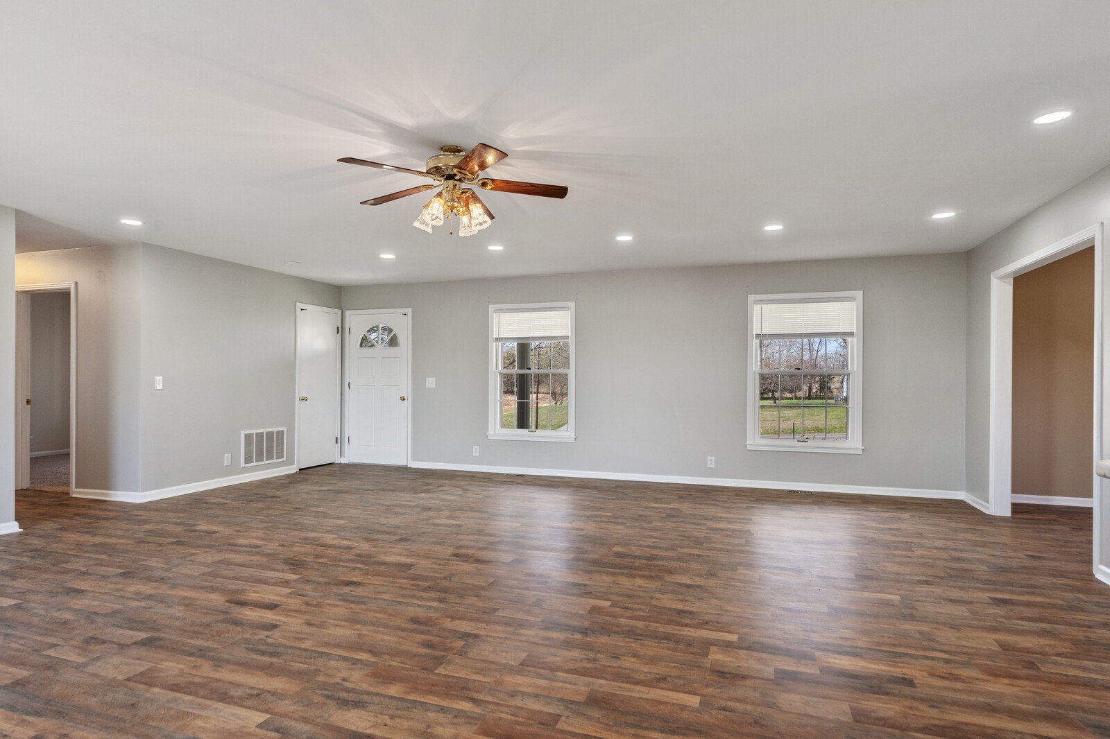 1462 New Deal Potts Road Portland, TN 37148 - Photo 14 of 29 a view of an empty room with window and wooden floor