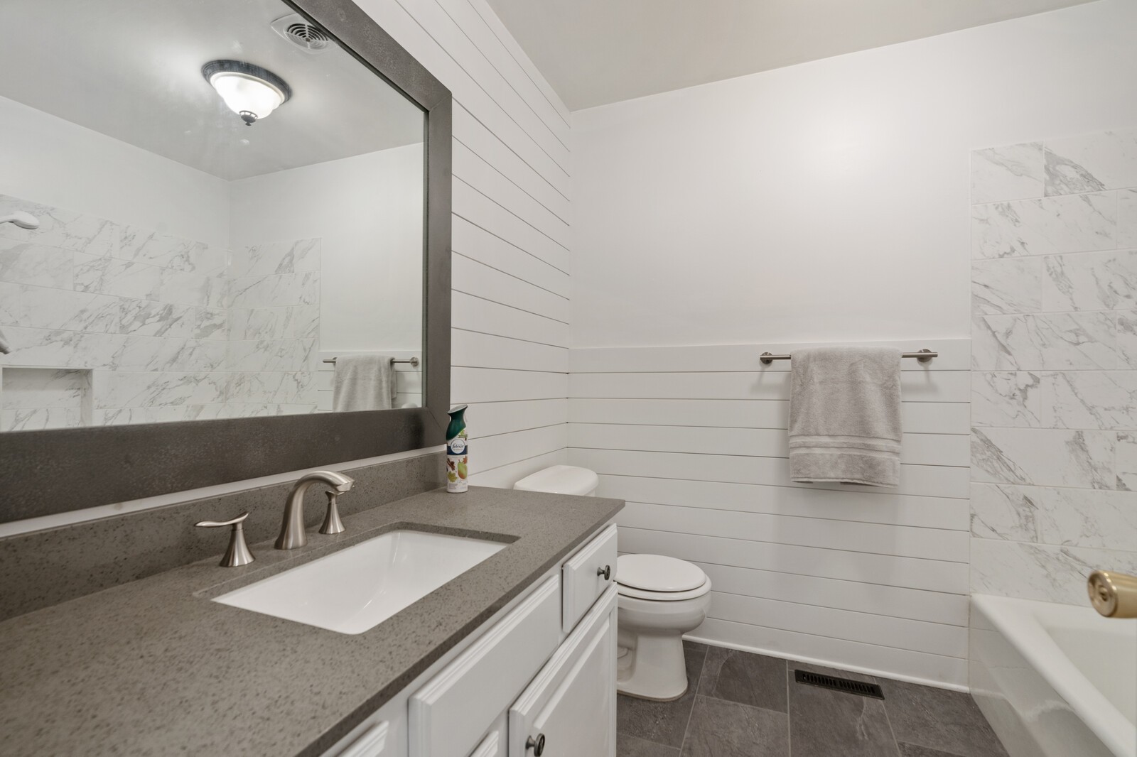 1462 New Deal Potts Road Portland, TN 37148 - Photo 22 of 29 a bathroom with a granite countertop sink a toilet and shower