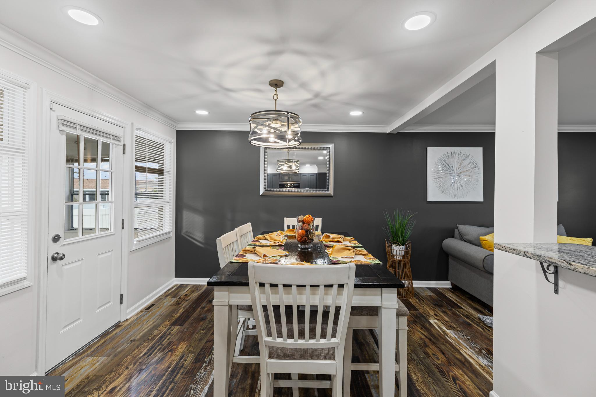 20 Summer Avenue Burlington, NJ 08016 - Photo 11 of 30 a view of a dining room with furniture a chandelier and wooden floor