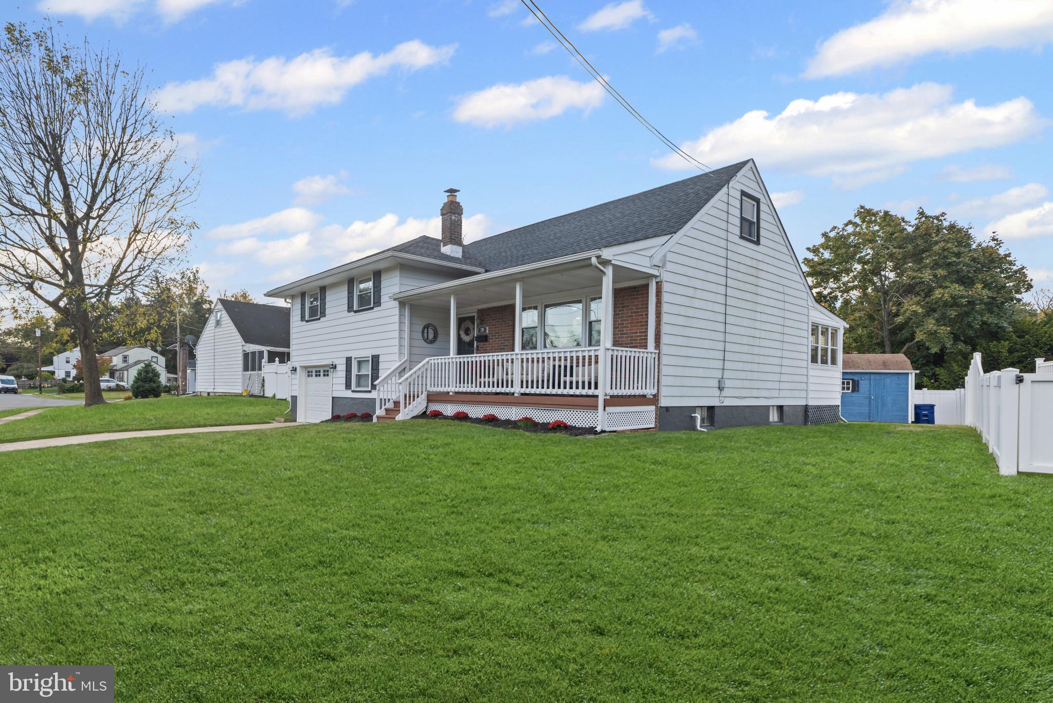 20 Summer Avenue Burlington, NJ 08016 - Photo 2 of 30 a front view of a house with a garden
