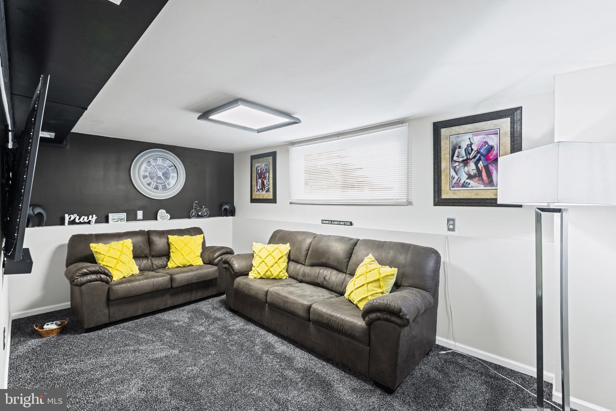 20 Summer Avenue Burlington, NJ 08016 - Photo 22 of 30 a living room with furniture and a wall painting