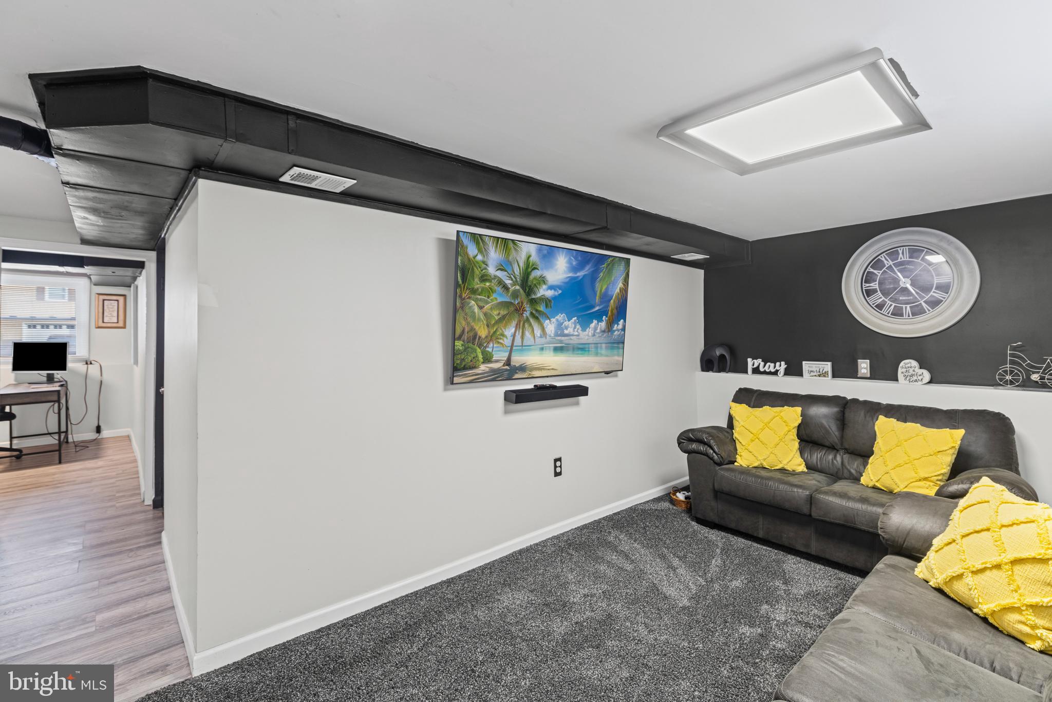 20 Summer Avenue Burlington, NJ 08016 - Photo 24 of 30 a living room with furniture and a wall painting