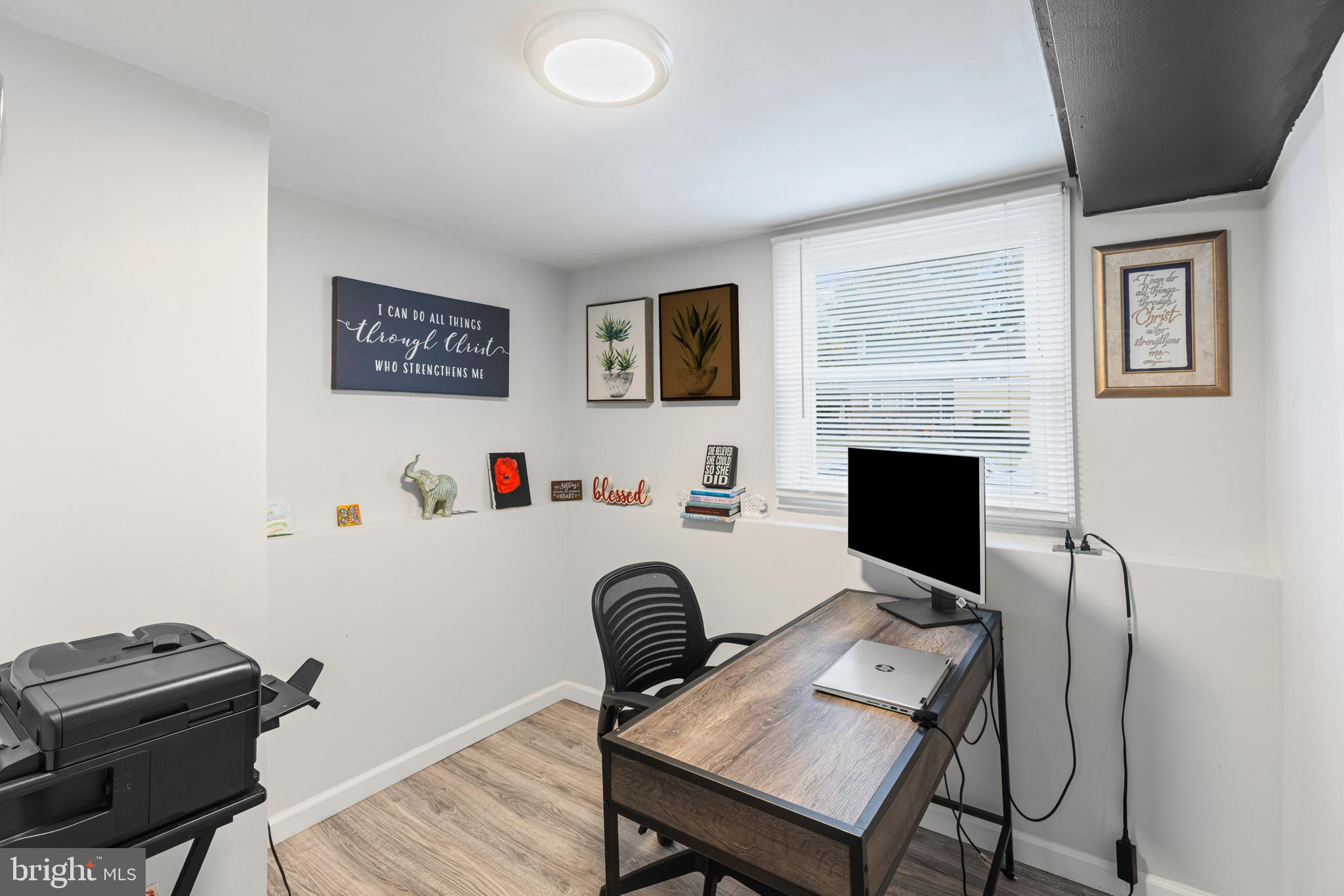 20 Summer Avenue Burlington, NJ 08016 - Photo 26 of 30 a view of a workspace with furniture and a fireplace