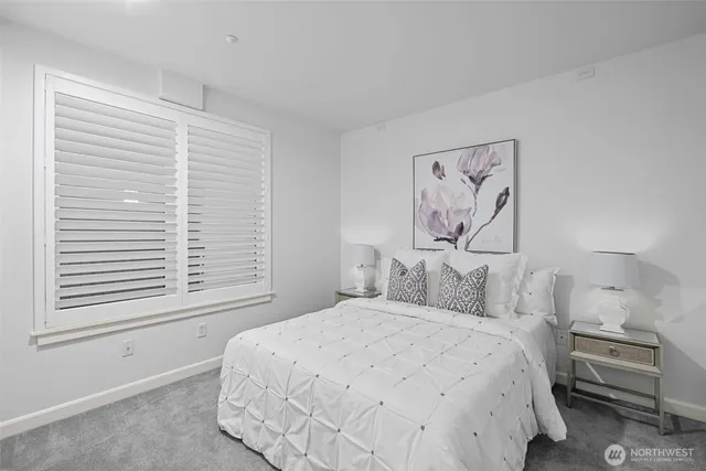 a bathroom with a shower curtain and a sink