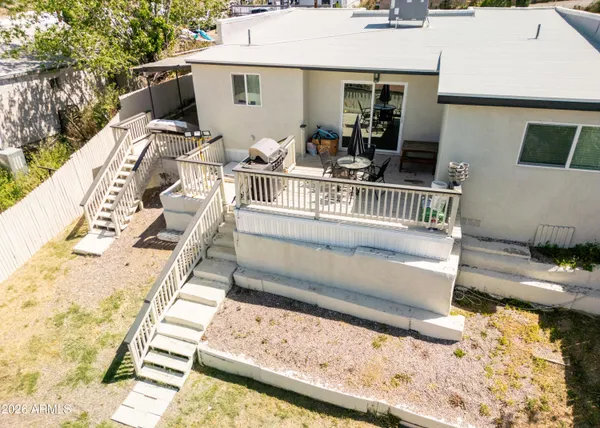 a front view of a house with swimming pool