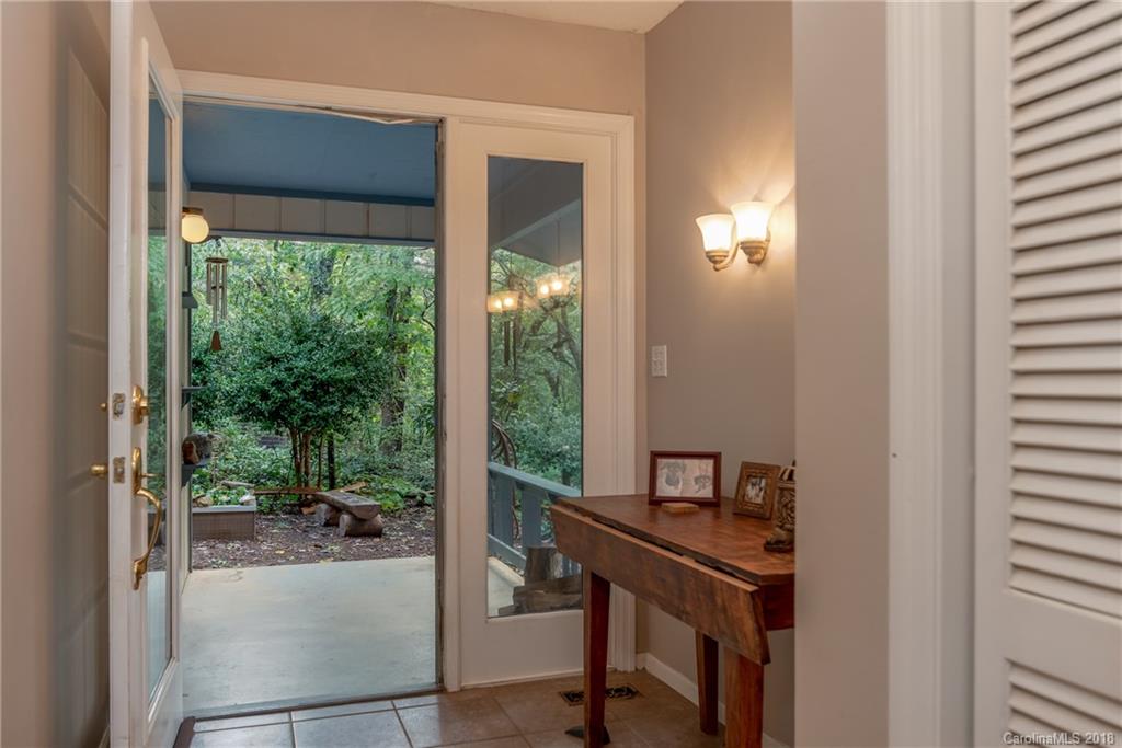 1235 Braewick Road Tryon, NC 28782 - Photo 16 of 22 a view of a workspace with a window