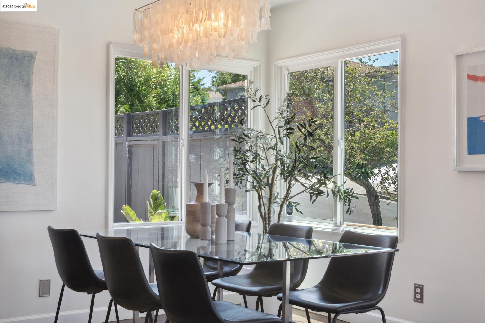 Undisclosed Address Oakland, CA 94619 - Photo 12 of 60 a view of a dining room with furniture window and outside view
