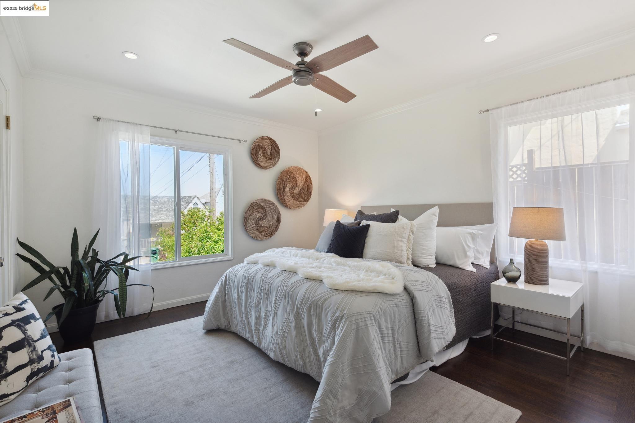 Undisclosed Address Oakland, CA 94619 - Photo 24 of 60 a bedroom with a bed window and couch