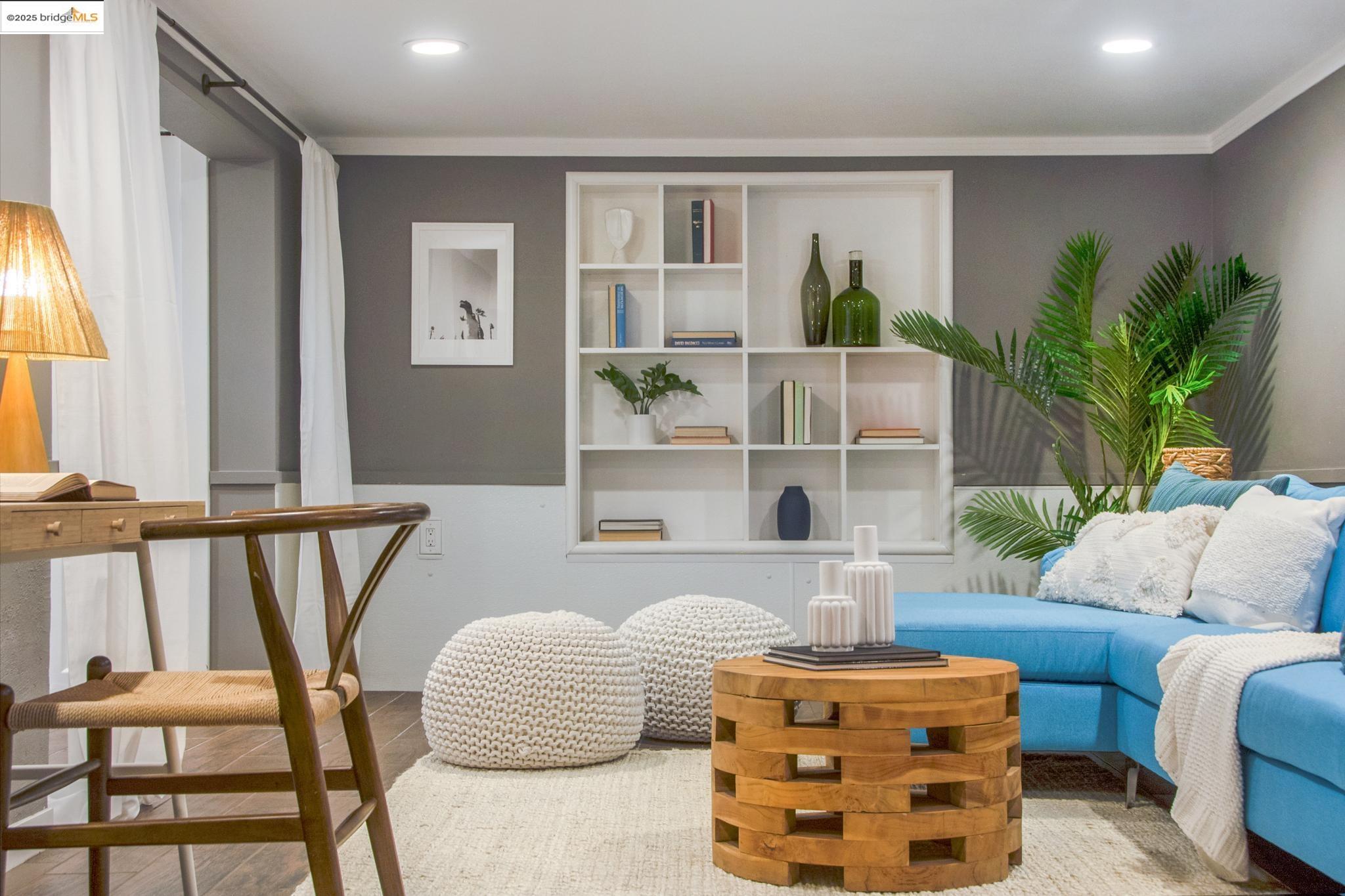 Undisclosed Address Oakland, CA 94619 - Photo 32 of 60 a living room with furniture and a large window