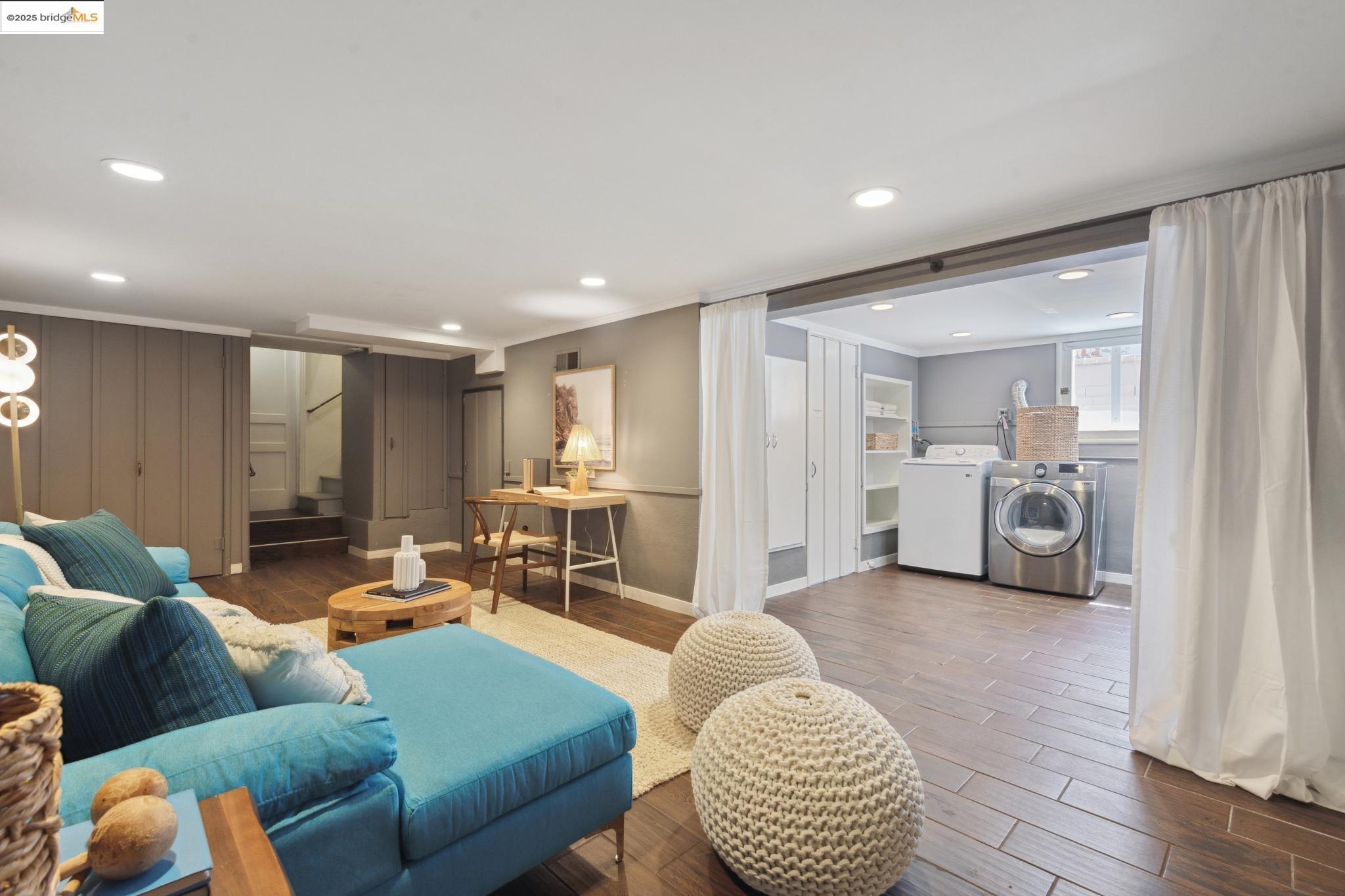 Undisclosed Address Oakland, CA 94619 - Photo 33 of 60 a living room with furniture and a view of bedroom