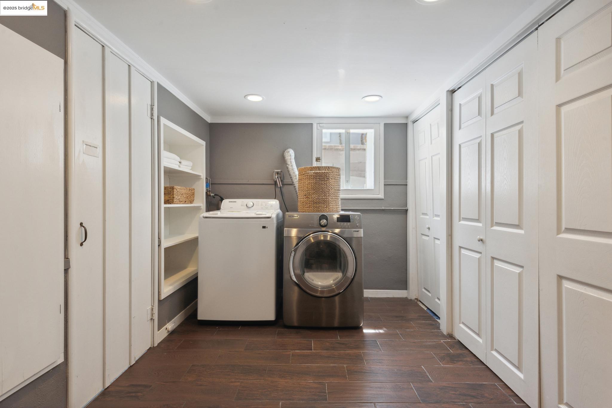 Undisclosed Address Oakland, CA 94619 - Photo 34 of 60 a view of a storage & utility room with washer and dryer
