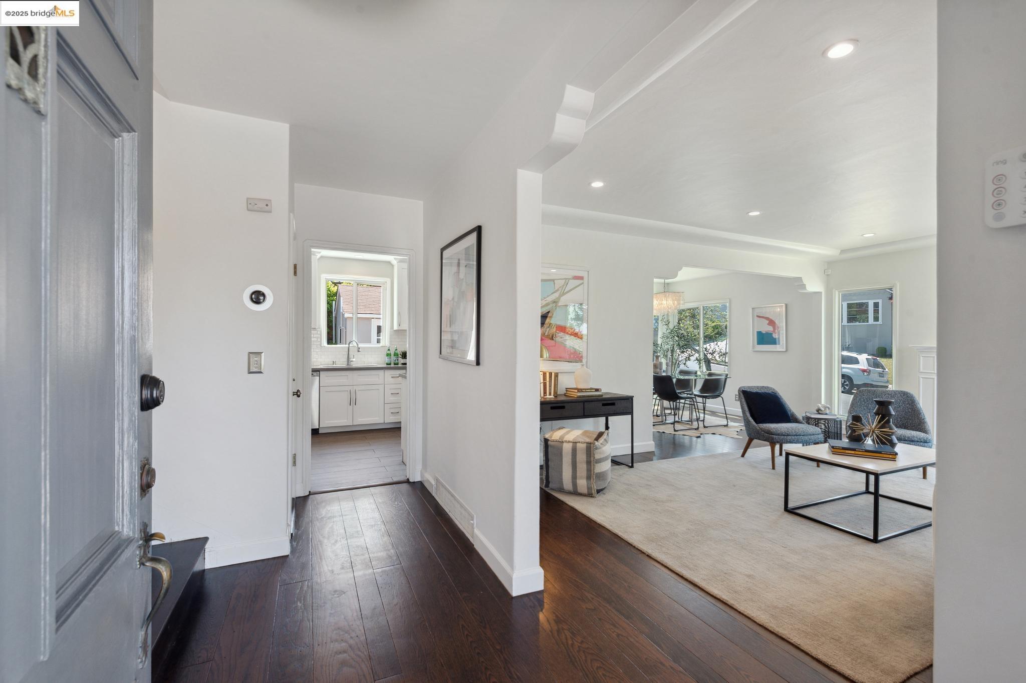 Undisclosed Address Oakland, CA 94619 - Photo 4 of 60 a view of a livingroom with furniture and wooden floor