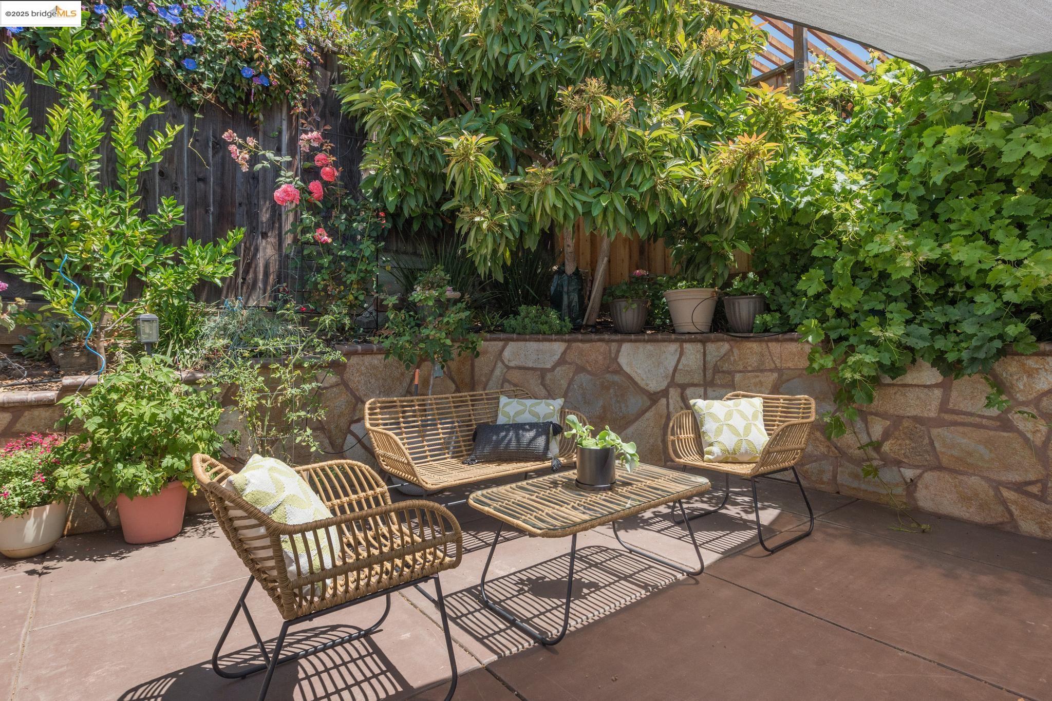 Undisclosed Address Oakland, CA 94619 - Photo 47 of 60 a view of a chairs and table in the patio
