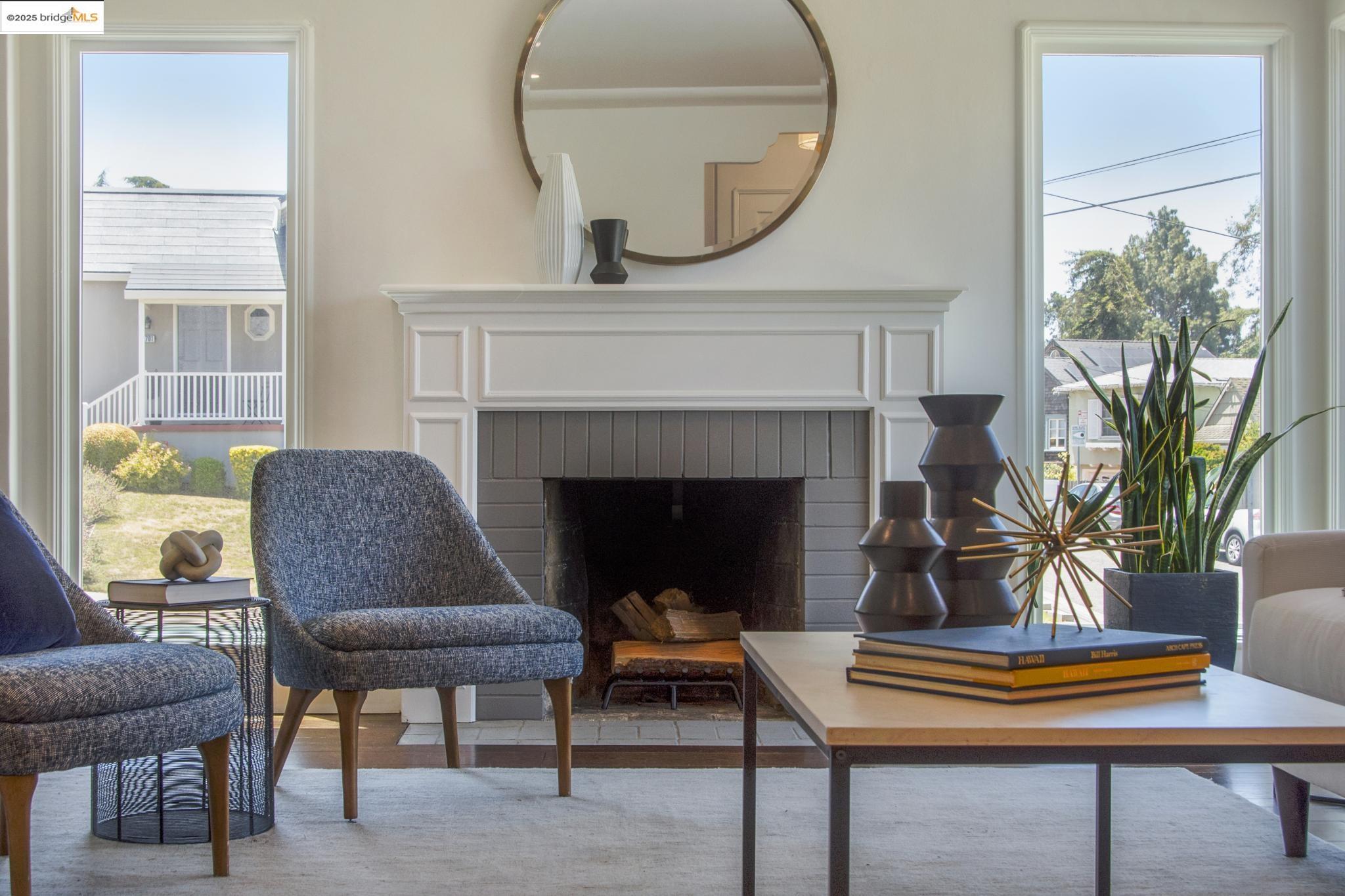 Undisclosed Address Oakland, CA 94619 - Photo 7 of 60 a living room with furniture and a fireplace