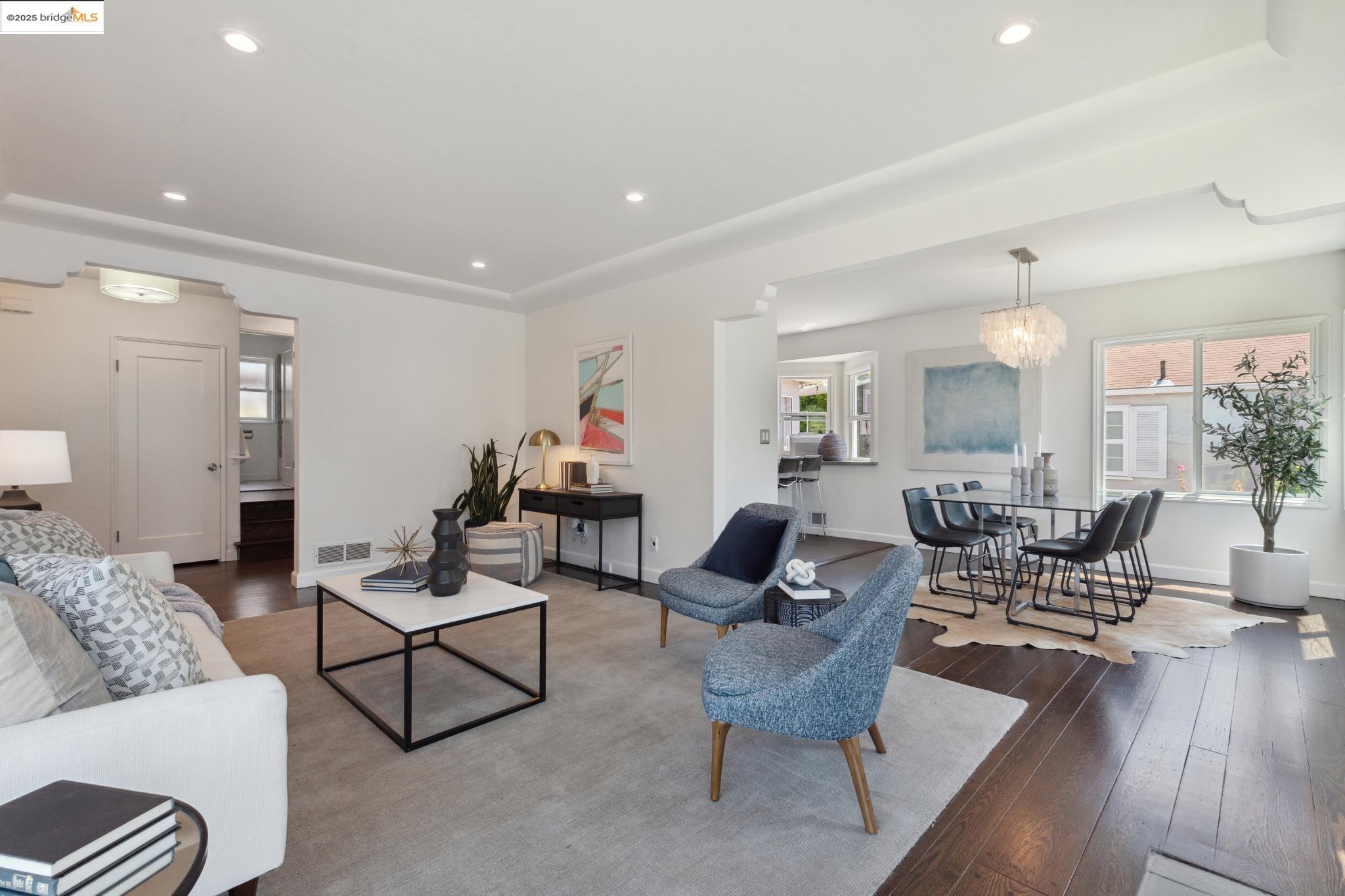Undisclosed Address Oakland, CA 94619 - Photo 10 of 60 a living room with furniture and wooden floor