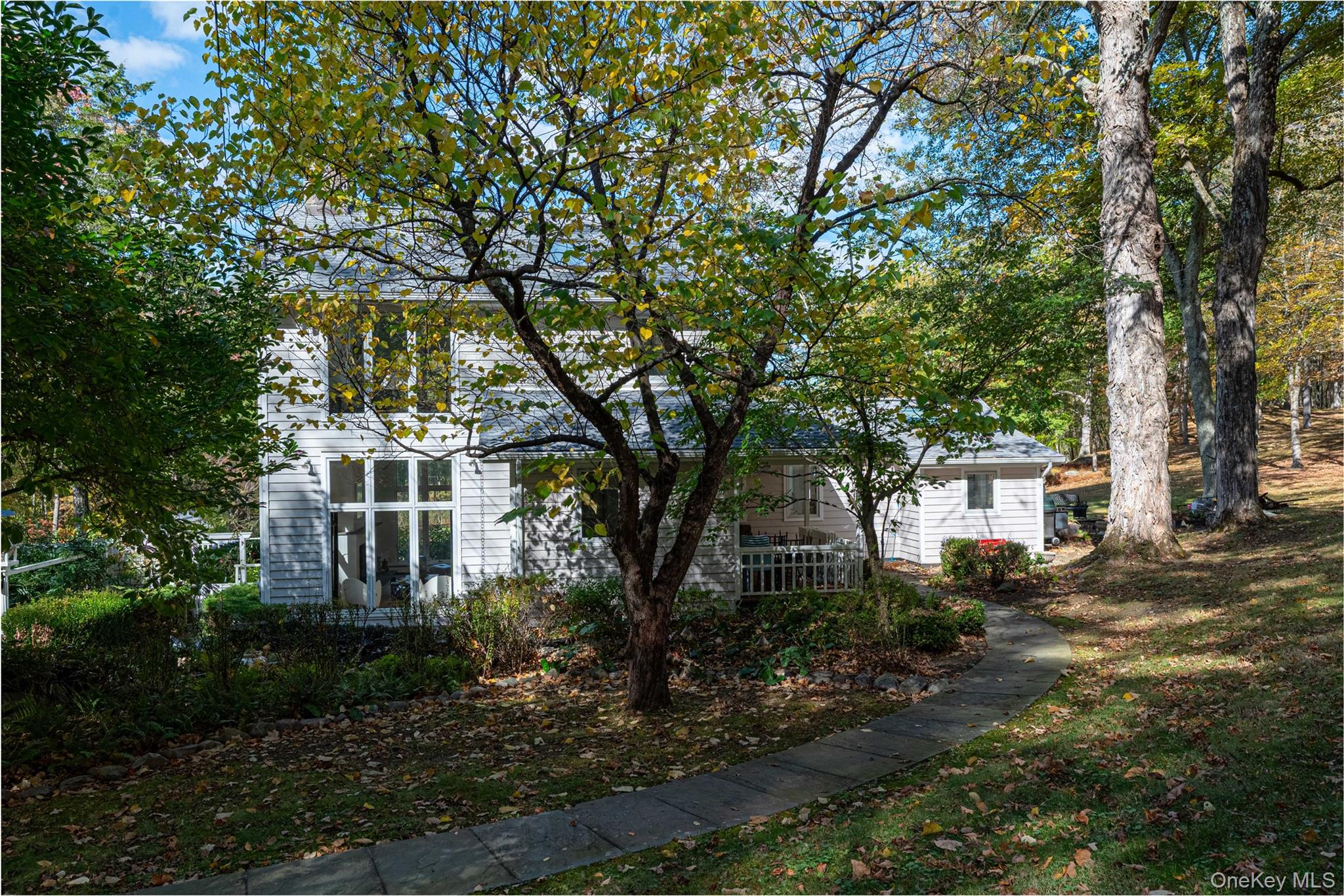 29 West Lake Road Warwick, NY 10990 - Photo 1 of 35 a view of a house with a tree in front