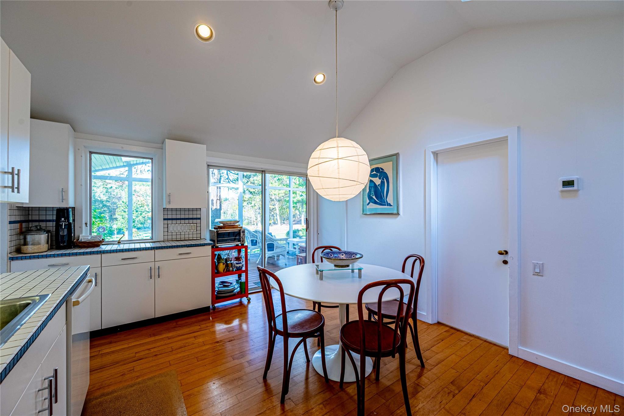29 West Lake Road Warwick, NY 10990 - Photo 11 of 35 a view of a dining room with furniture and wooden floor