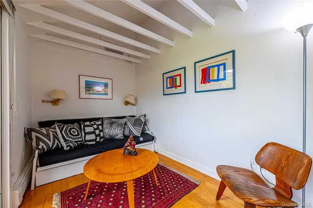 a living room with a couch and a table