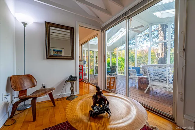 a room with furniture and a large window