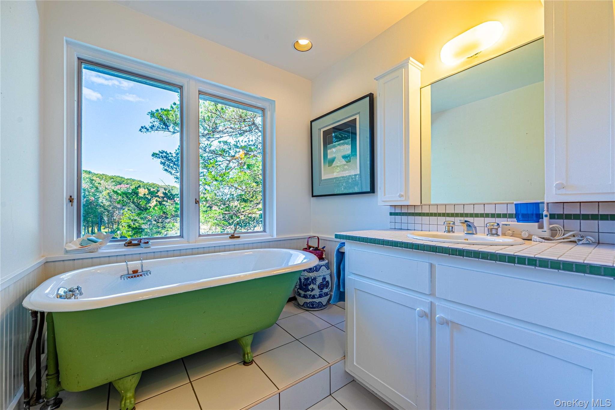 29 West Lake Road Warwick, NY 10990 - Photo 19 of 35 a bathroom with a sink and a bathtub