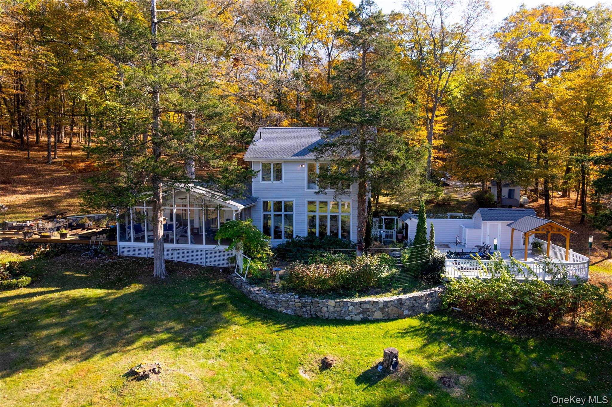 29 West Lake Road Warwick, NY 10990 - Photo 2 of 35 a view of a house with swimming pool and a yard