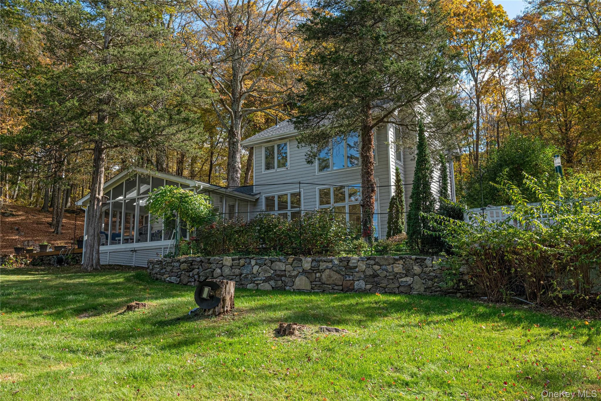 29 West Lake Road Warwick, NY 10990 - Photo 30 of 35 a front view of a house with a yard and tree