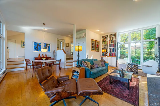 a living room with furniture and a table