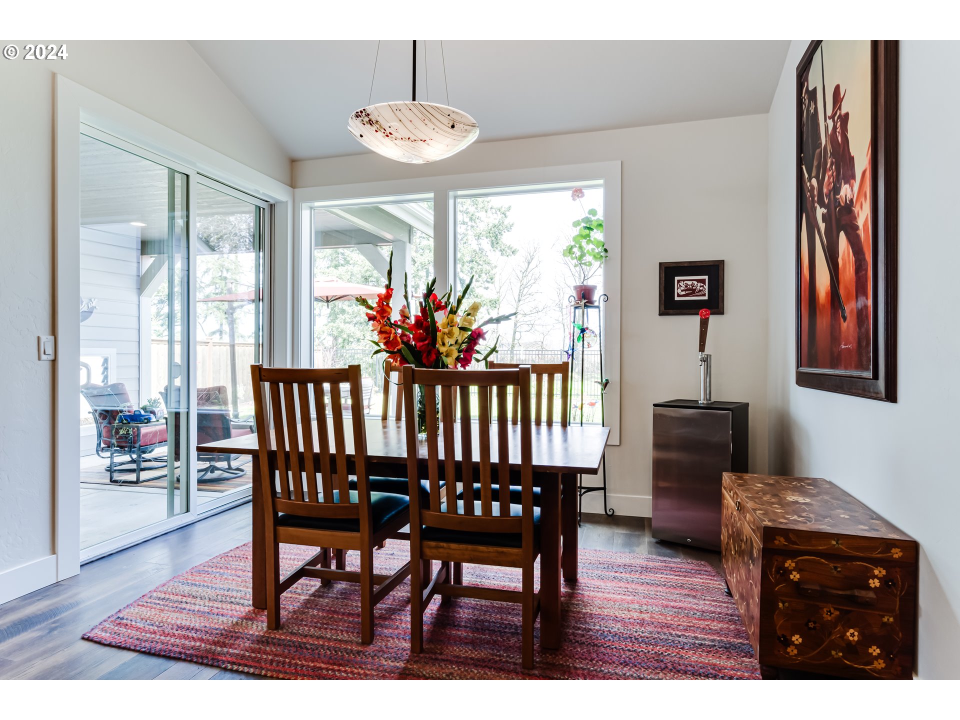 1876 John Day Drive Eugene, OR 97408 - Photo 12 of 43 a dining room with furniture a rug and a chandelier