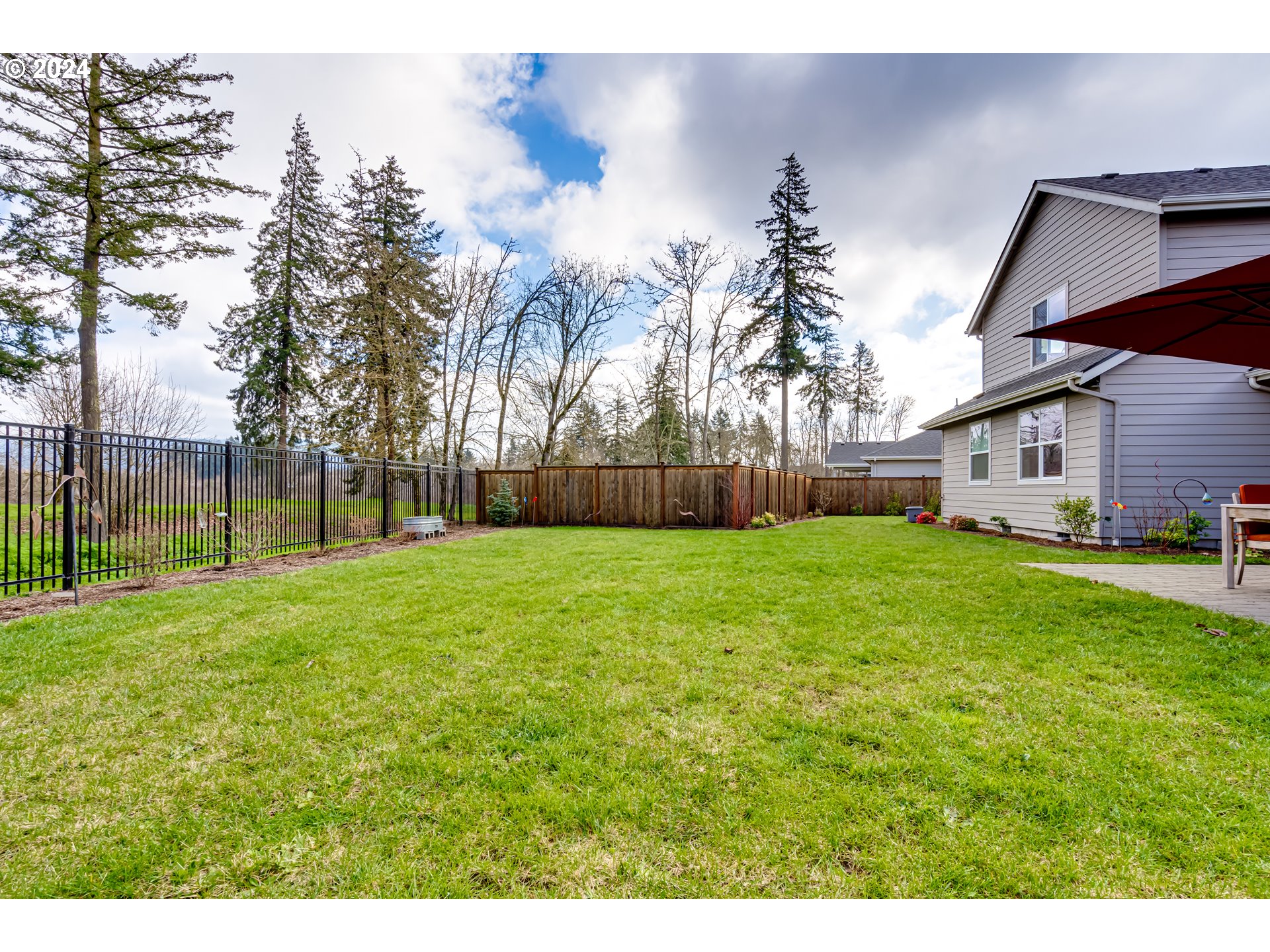 1876 John Day Drive Eugene, OR 97408 - Photo 40 of 43 a backyard of a house with lots of green space