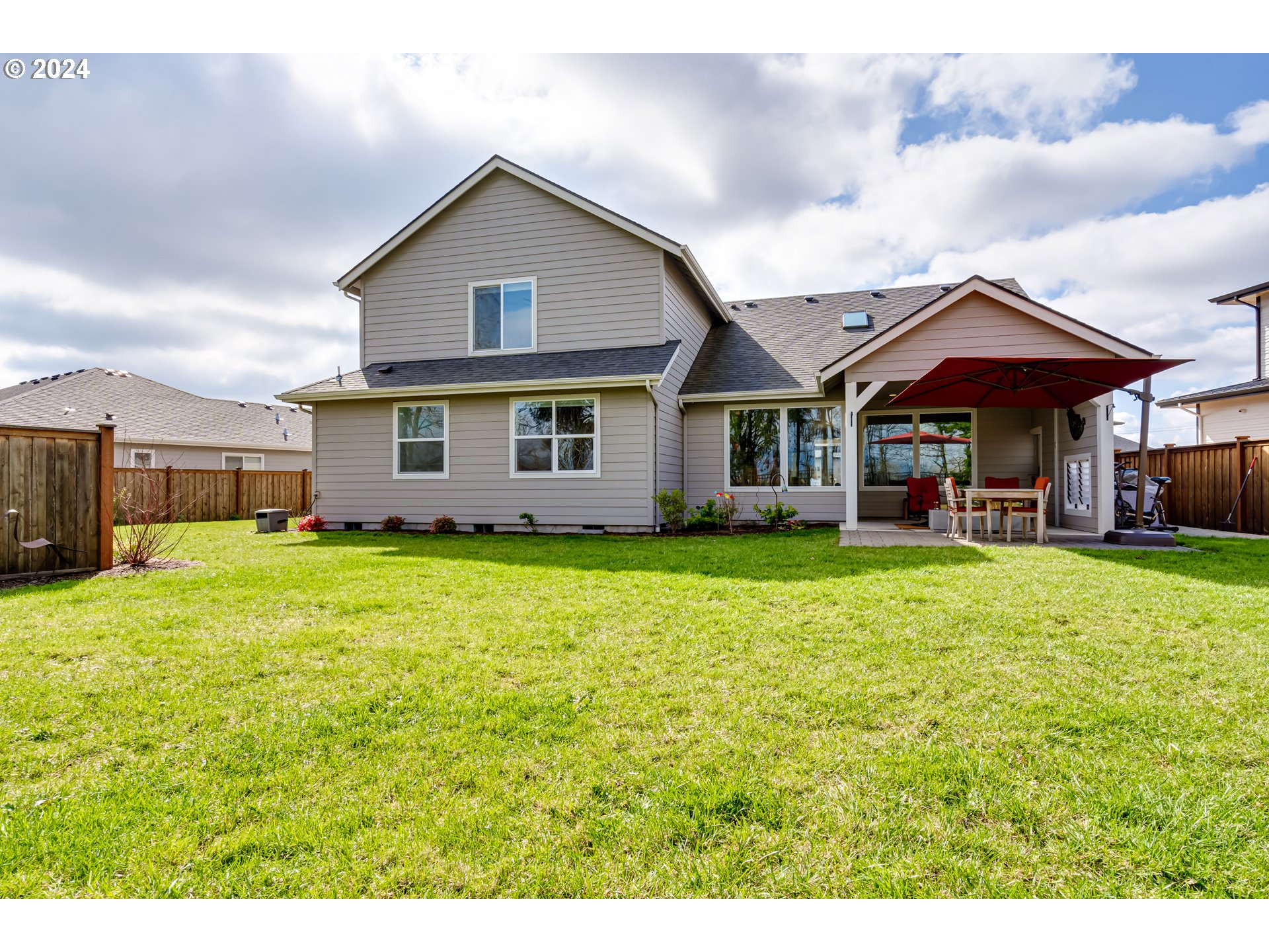 1876 John Day Drive Eugene, OR 97408 - Photo 43 of 43 a front view of a house with a garden