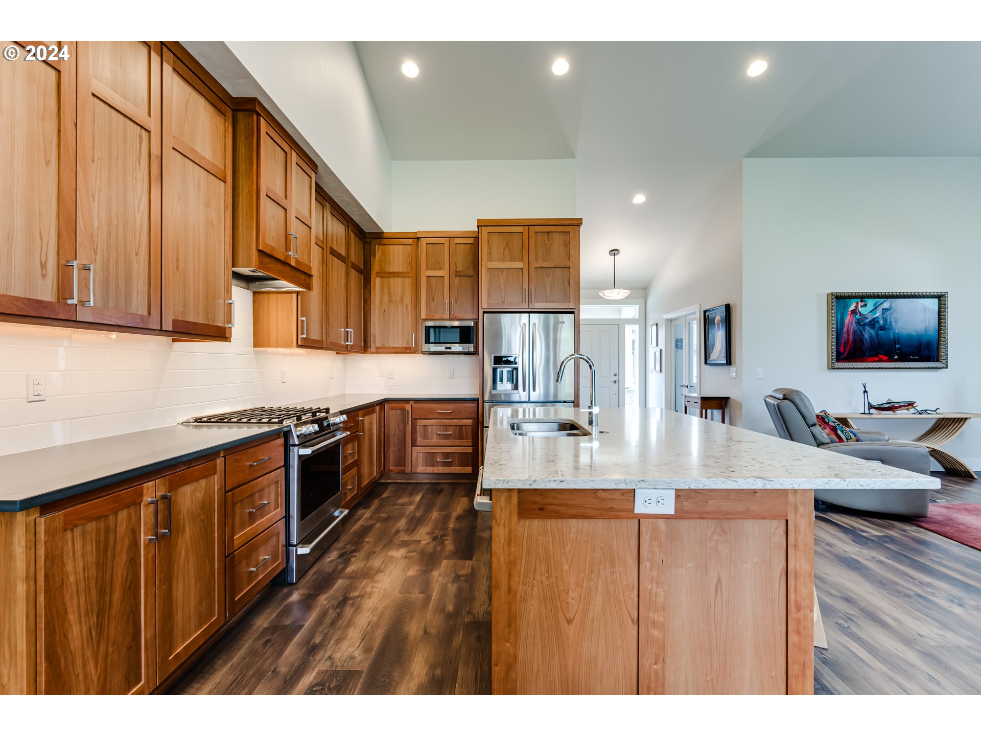 1876 John Day Drive Eugene, OR 97408 - Photo 9 of 43 a open kitchen with stainless steel appliances granite countertop a stove refrigerator and cabinets