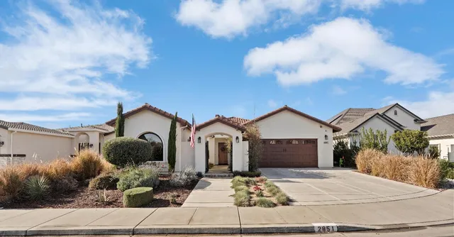 a front view of a house with entertaining space