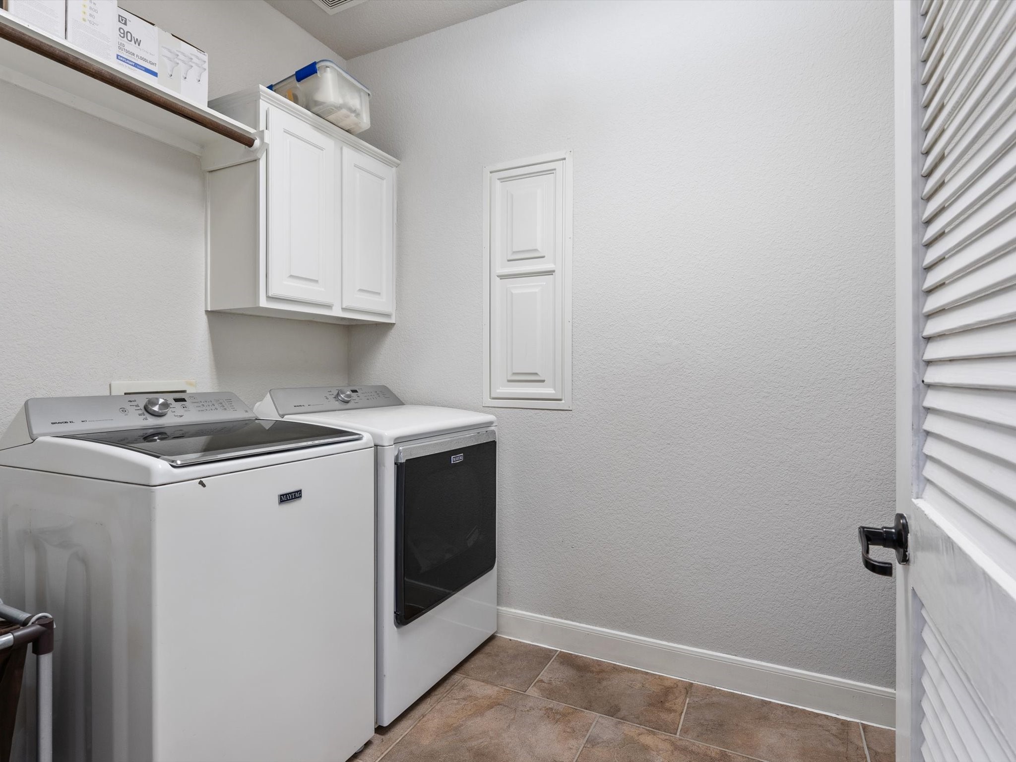 6003 Tarra Firma Drive Spring, TX 77379 - Photo 15 of 43 This laundry room is perfectly positioned right next to the kitchen for maximum daily convenience. Tucked away yet easily accessible, it makes multitasking a breeze while keeping your home organized and clutter free.