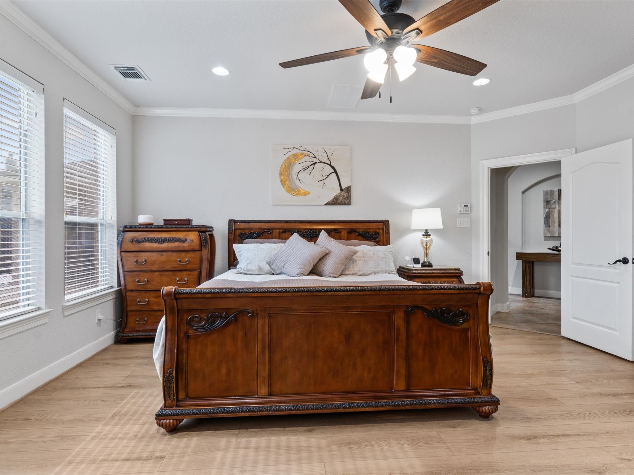 6003 Tarra Firma Drive Spring, TX 77379 - Photo 16 of 43 Secluded 1st-floor primary suite featuring crown-molding and private views of the backyard oasis.