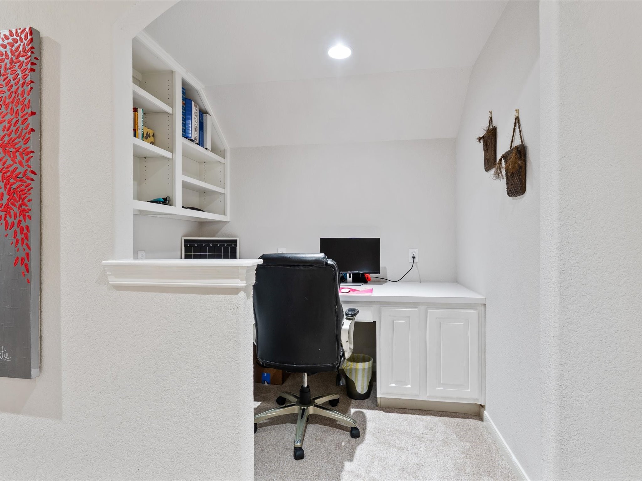 6003 Tarra Firma Drive Spring, TX 77379 - Photo 28 of 43 This clever office nook at the top of the stairs makes perfect use of every square inch. Flooded with natural light from the second floor, it offers a quiet and productive workspace that remains connected to the rest of the home. It is the ideal spot for a home business, a student study station, or a creative corner.