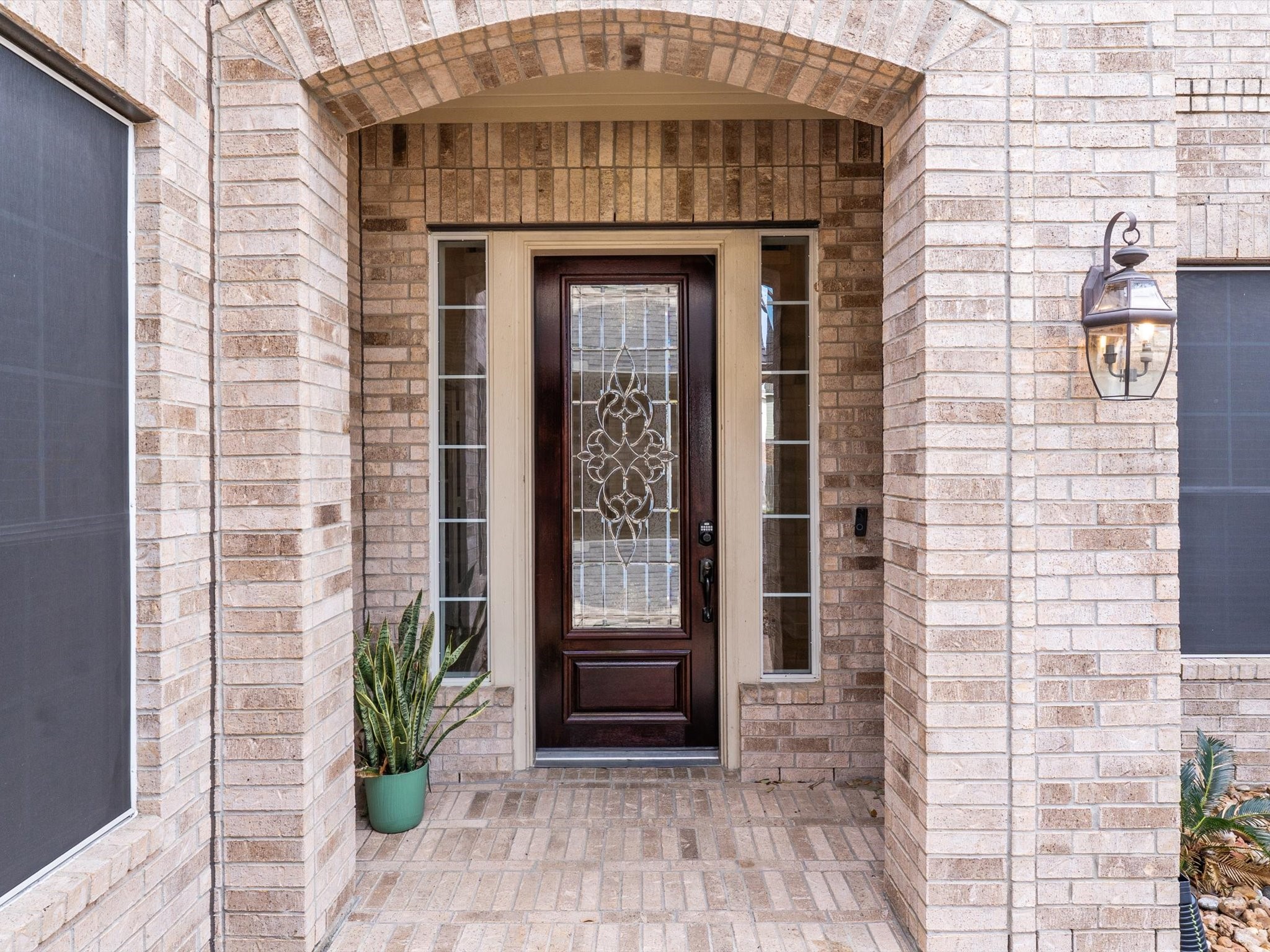 6003 Tarra Firma Drive Spring, TX 77379 - Photo 3 of 43 Step through the solid wood door of this timeless all-brick home into a breathtaking two-story foyer. Whether you're welcoming guests or coming home after a long day, this entrance sets a tone of sophisticated comfort.