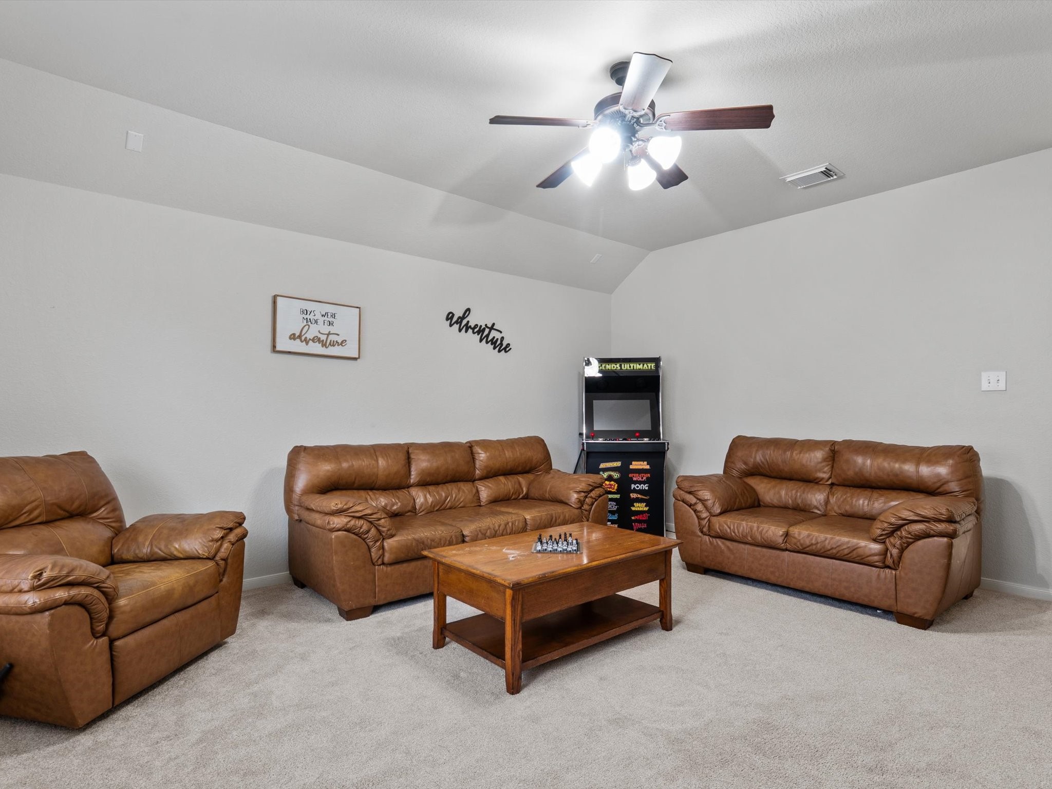 6003 Tarra Firma Drive Spring, TX 77379 - Photo 31 of 43 This massive game room offers endless possibilities for fun and relaxation. Whether you envision a premier home cinema, a billiards lounge, or a high-tech gaming suite, this expansive space is ready to host your next movie night or big game celebration.