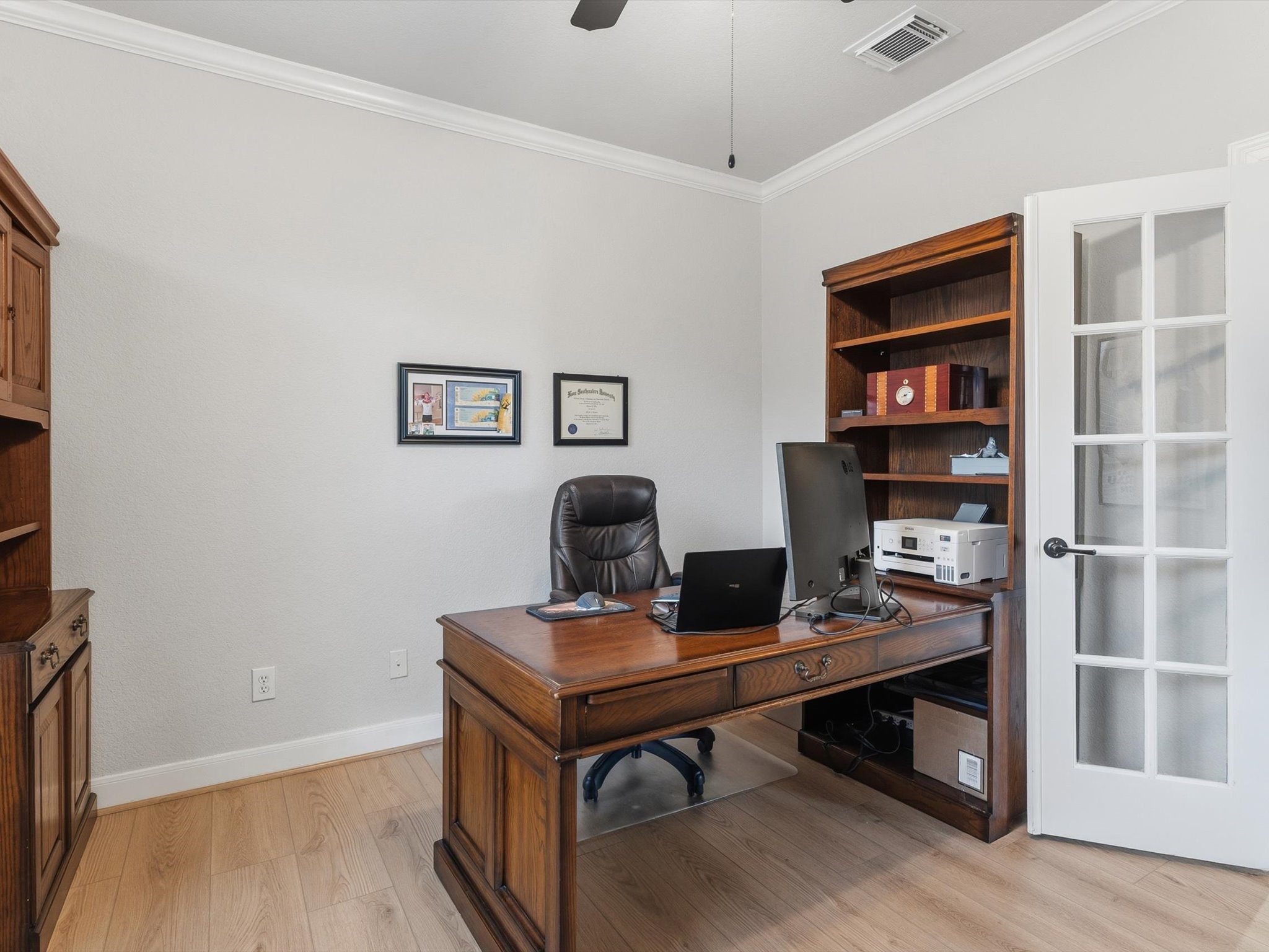 6003 Tarra Firma Drive Spring, TX 77379 - Photo 7 of 43 Executive home office located off the entry features classic French doors, offering the perfect private environment for remote work or a quiet library