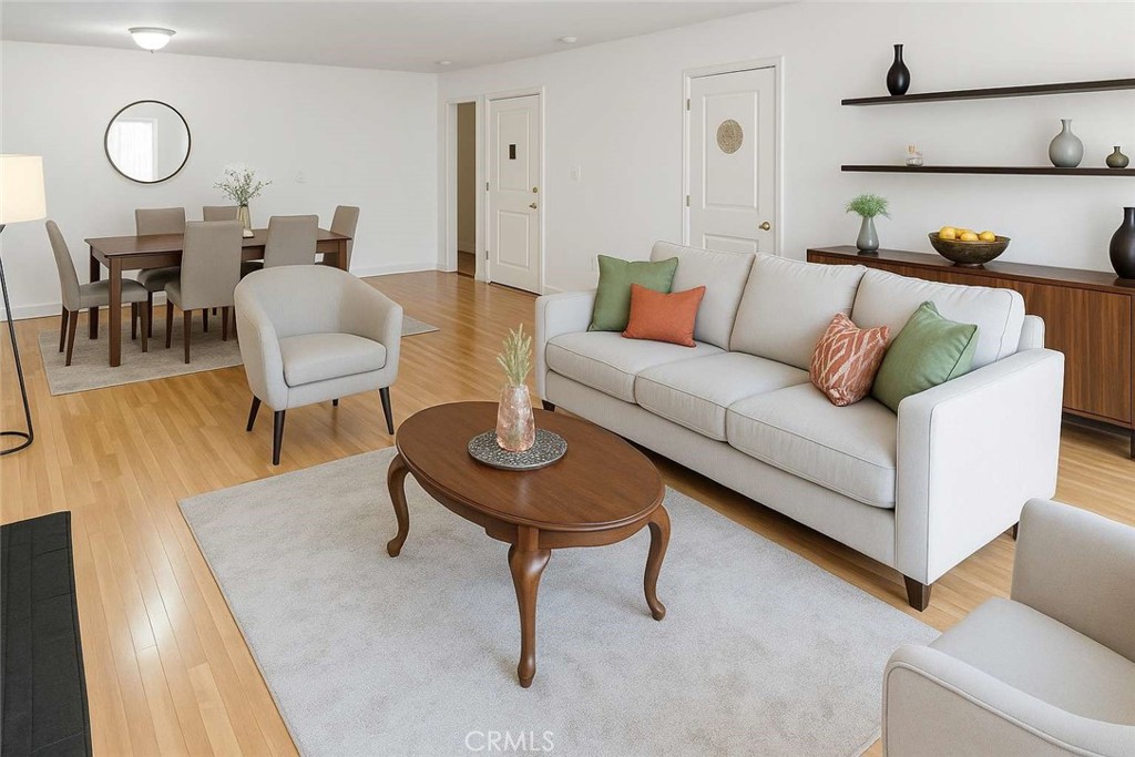 3933 North Virginia Road, Unit 202 Long Beach, CA 90807 - Photo 1 of 1 a living room with furniture