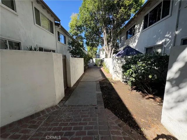 a view of a pathway with a house