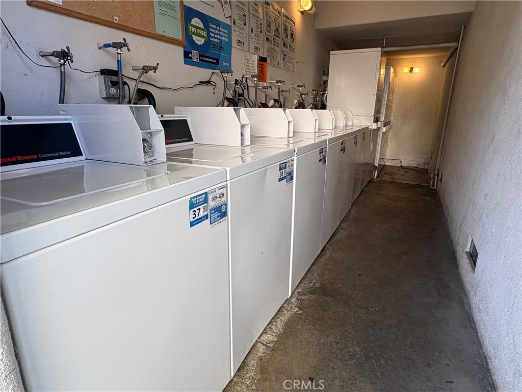 18619 Collins Street, Unit F29 Tarzana, CA 91356 - Photo 28 of 29 a utility room with dryer and washer