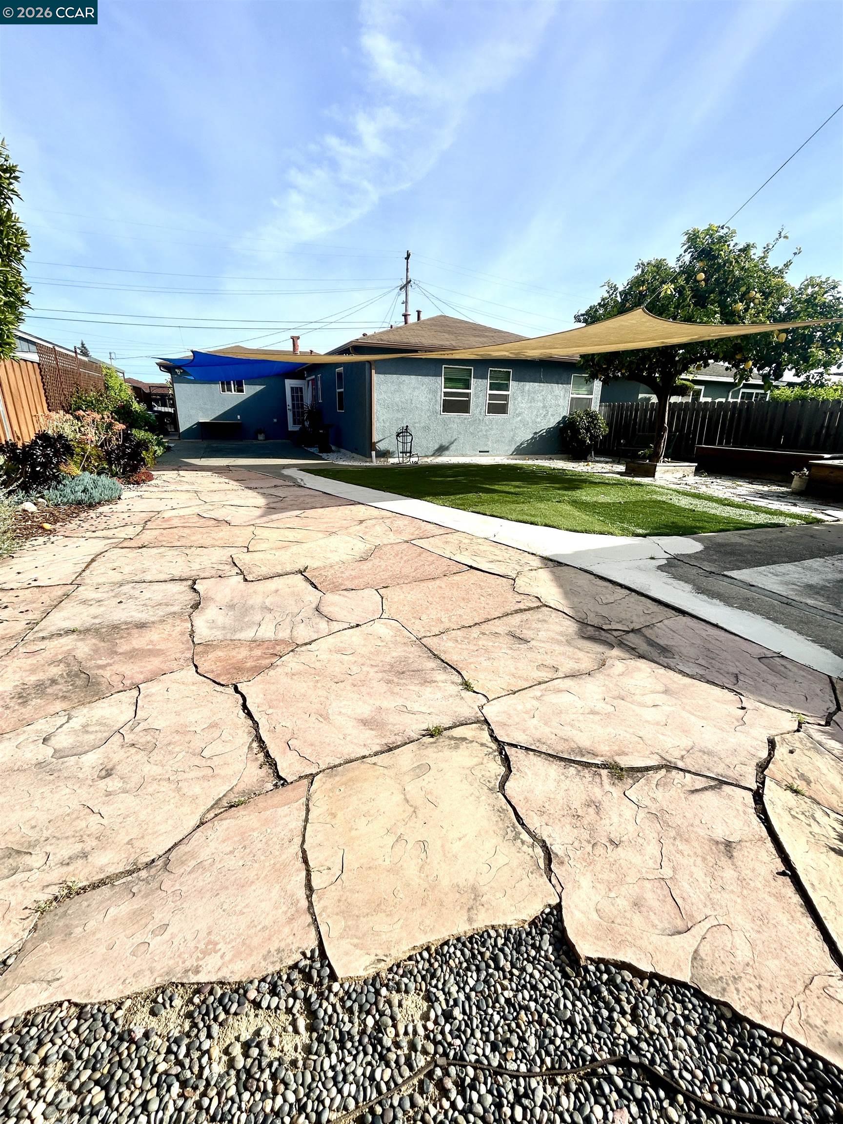 356 Frederic Avenue Hayward, CA 94544 - Photo 8 of 10 a front view of a house with a yard