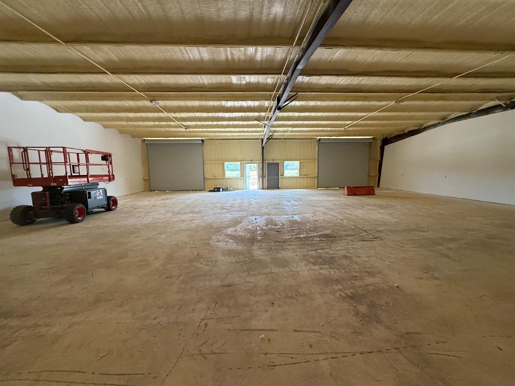 750 Wible Road Sherman, TX 75092 - Photo 6 of 26 a view of a livingroom with a stove and a window
