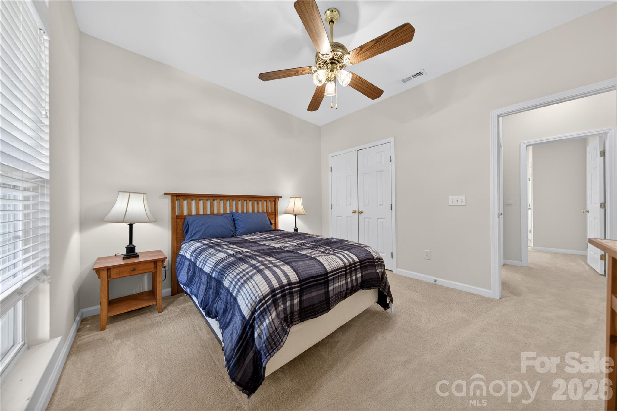 533 Fair Oaks Drive Fort Mill, SC 29708 - Photo 23 of 33 a bedroom with a bed and a ceiling fan