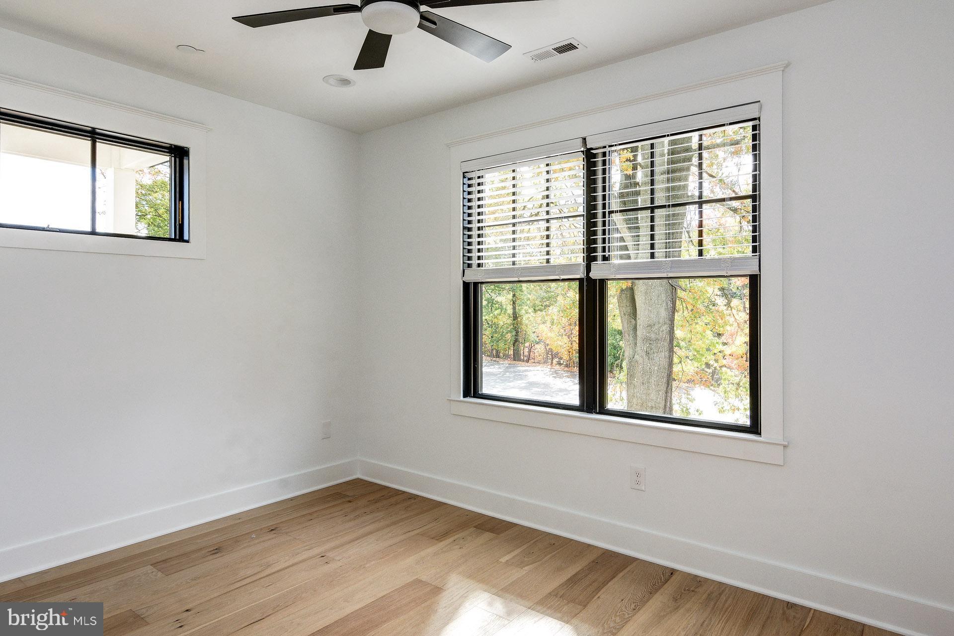 20 East Redman Avenue, Unit D Haddonfield, NJ 08033 - Photo 30 of 43 an empty room with a window